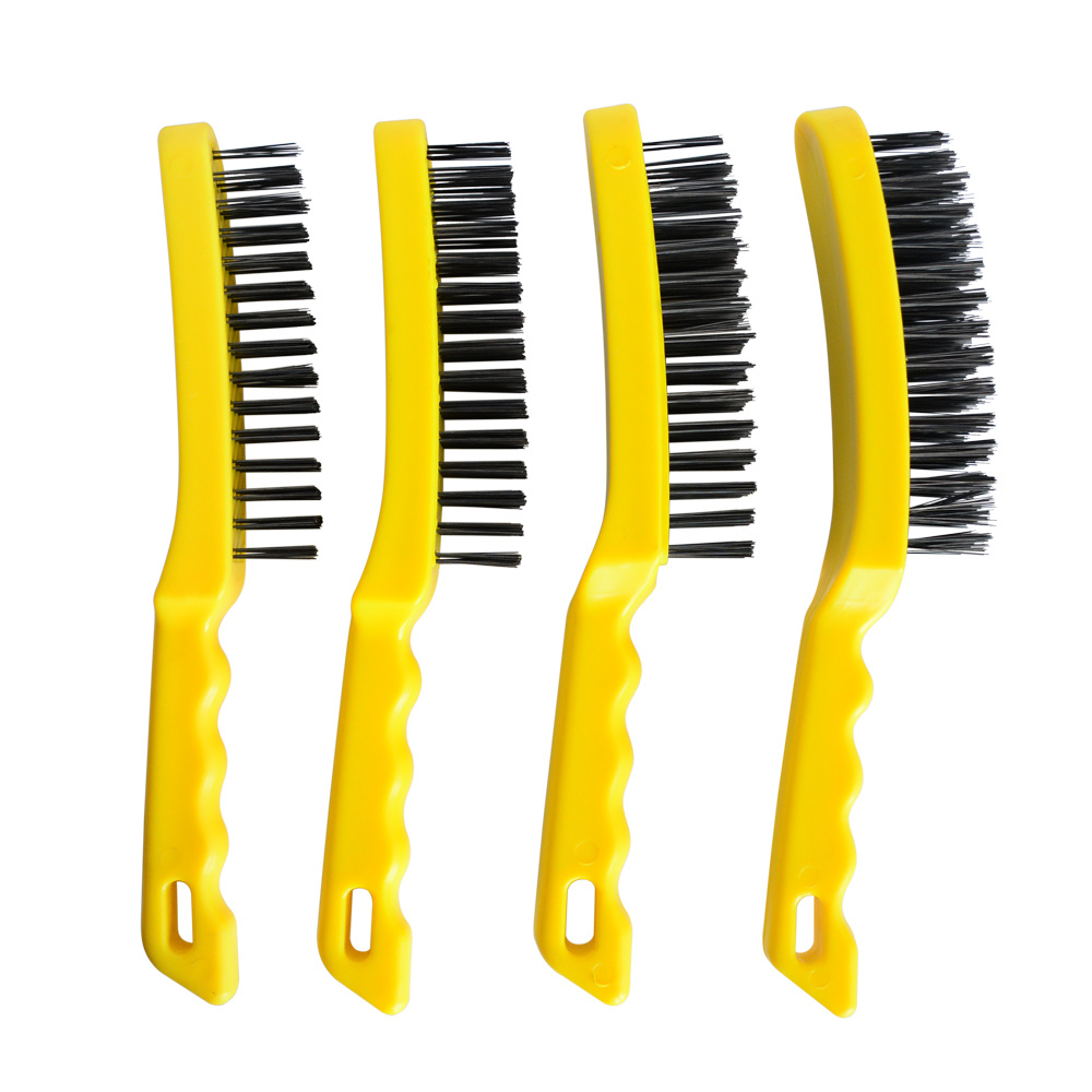 Wire brush on a metal brush with a yellow handle.